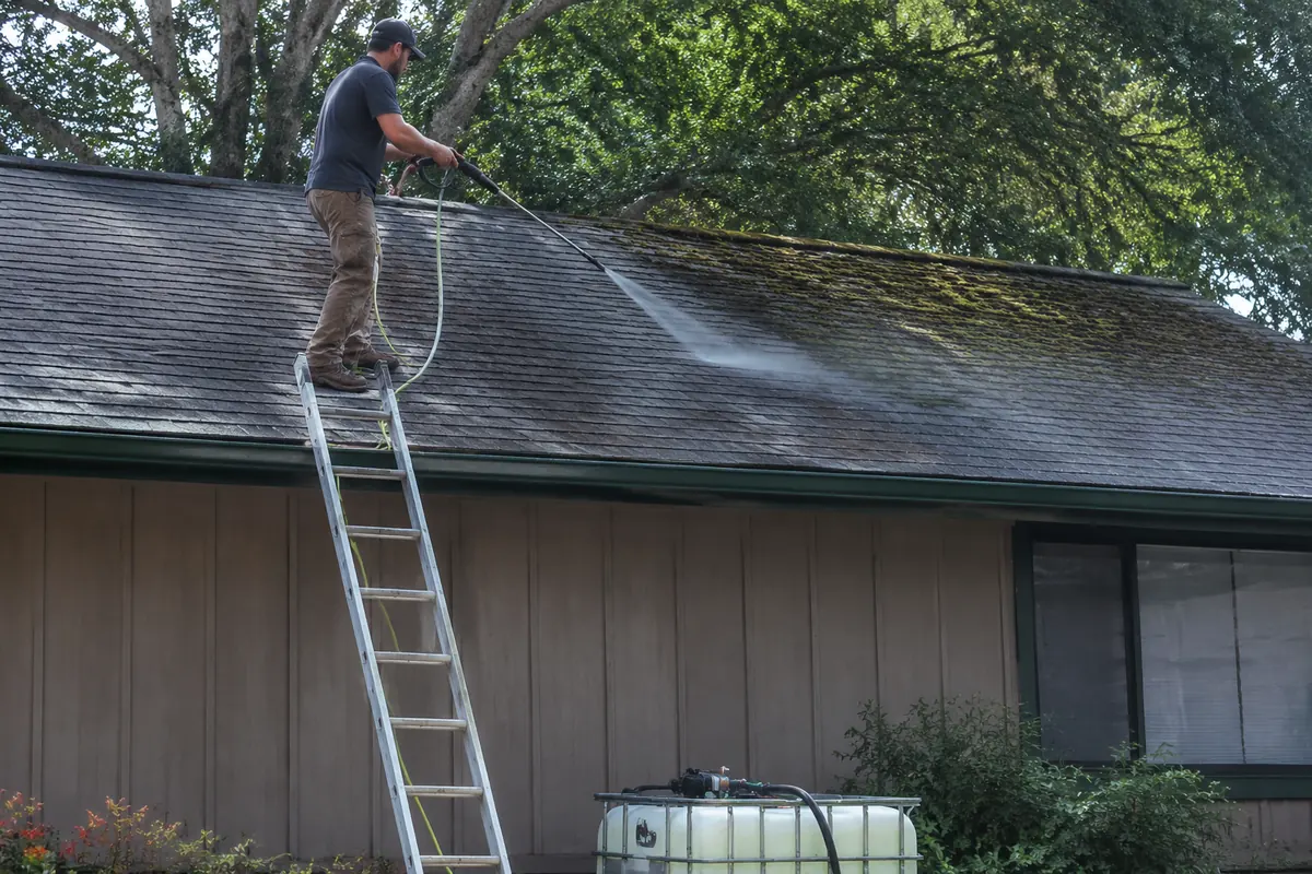 Algae, Moss & Lichen Shingle Roof Cleaning underway on a property in Boise, ID
